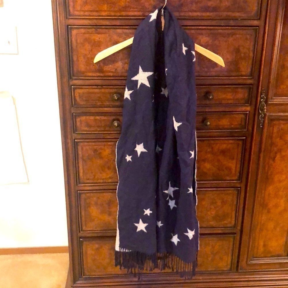 Blue scarf with grey stars on it